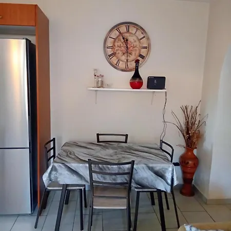 Vouzianas *